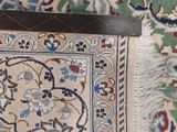 a rug on the floor next to a rug on the floor