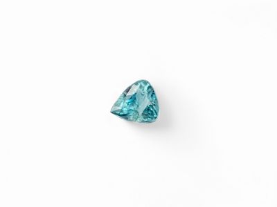 a trillion cut blue diamond on a white background