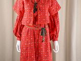 an image of a mannequin dressed in a red dress