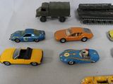 many toy cars that are sitting on a table