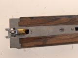 a close up of a piece of wood that is attached to a wall