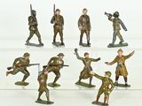 six figurines of men in military uniforms on display