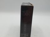 a close up of a box of lipstick on a white surface