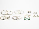 many different rings and rings that are sitting on a table