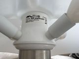 a close up view of a toilet with a white tank