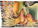 a tapestry with a bird on it hanging on a wall