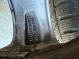 a close up view of a tire on a vehicle