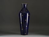an image of a blue vase with gold stars on it