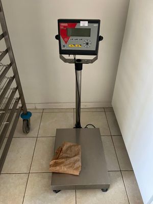 an image of a scale with a bag on it