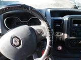 dashboard of a car with a steering wheel and dashboard controls