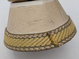 a close up of a hat on a mannequin head