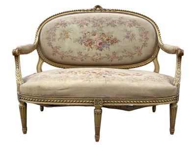 an image of a couch with a floral upholstered back and arms