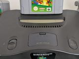 a nintendo 64 game system sitting on top of a table