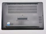 a laptop that is sitting on a white table