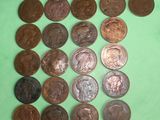 a lot of coins that are on a green surface