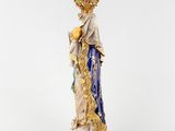 a statue of a woman with a crown on her head