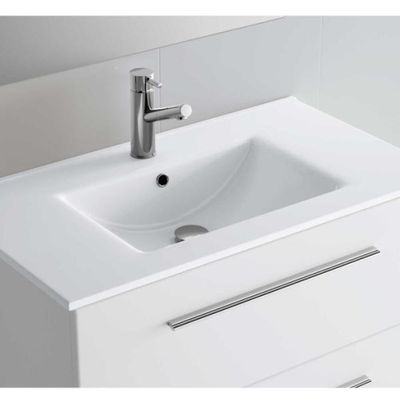 a white bathroom sink with a chrome faucet on it