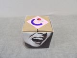 a box with a picture of a smiling woman on it