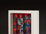 une image représentant une boîte contenant un flacon de parfum