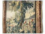 an image of a tapestry hanging on a wall next to a window