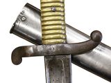 a close up of a sword with a metal handle