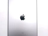 an image of a close up of an apple ipad on a white surface