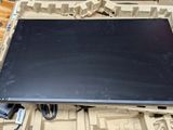 a laptop that is sitting on top of a pallet