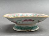 two small bowls sitting next to each other on a table