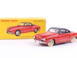 Voiture rouge Dinky Toys avec sa boîte, sur fond blanc