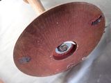 a close up of a wooden object with a hole in it