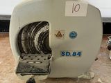 a machine that is sitting on a wooden floor