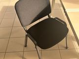 a chair that is sitting in front of a table