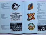 a book with pictures of military personnel in it
