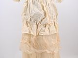 a white dress with ruffles on a mannequin mannequin mannequin mannequin mannequin mannequin mannequin manne