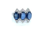a three stone sapphire and diamond ring