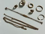 a lot of rings and bracelets on the table