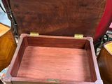 a wooden box that is sitting on top of a table