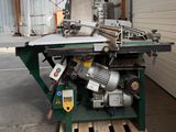 a machine that is sitting on a pallet in a warehouse