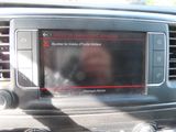 a picture of a car ' s dashboard with a display