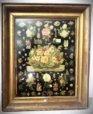 painting of a basket of flowers in a gold frame on a black background