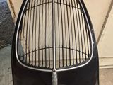 an image of a car grill with a large grill on top of it