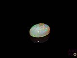 an oplite is shown in the dark with a black background