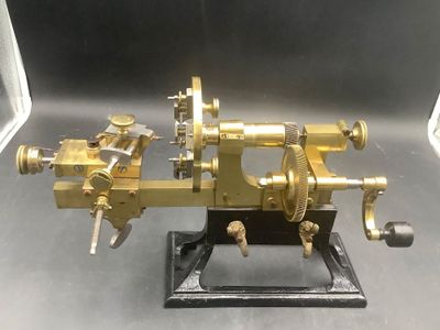 a small machine that is on display on a table