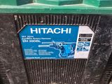 a green trash can that has a sticker on it