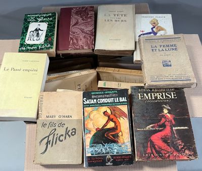 several books are stacked on top of each other on a table