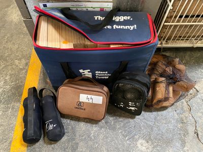 many bags of luggage sitting on the ground next to a luggage bag