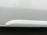 a close up of a door handle on a white car