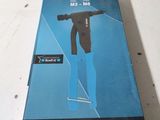an image of a box with a drill in it sitting on a table