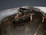 a close up of a piece of metal with a handle