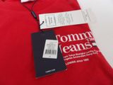 a red t - shirt with a tag on it that says tommy jeans